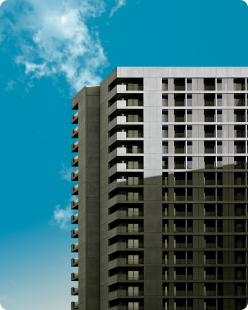 Modern high-rise residential building with contemporary design under clear sky representing premium real estate in Bangalore by Profuse Property.